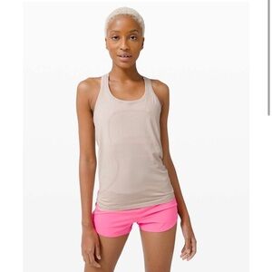 Lululemon swiftly tech racerback in dune/mink pink.